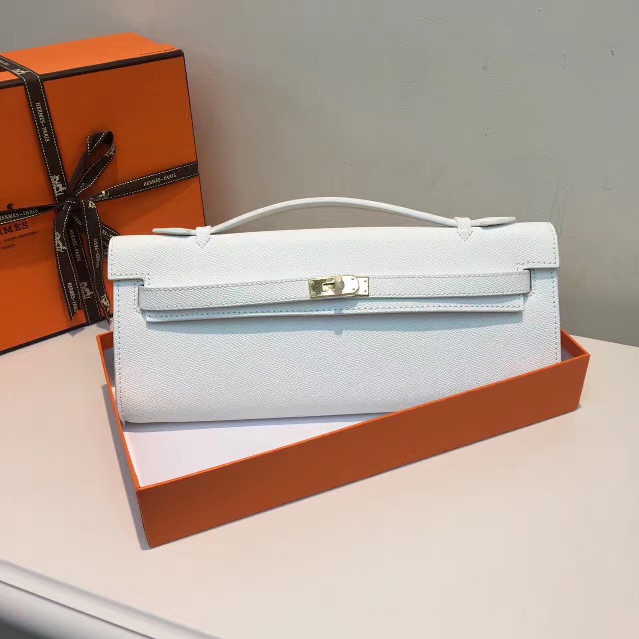 hermes white clutch